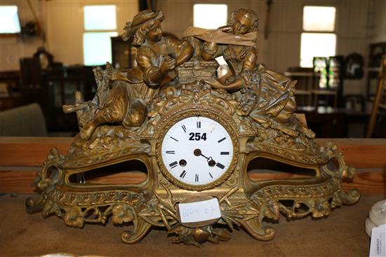 A gilt bronze figural mantel clock